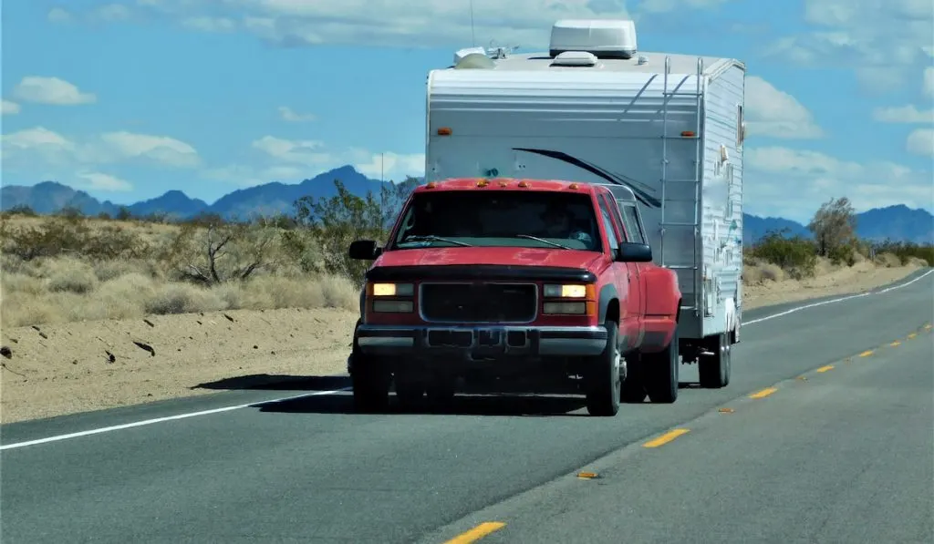 pickup truck hauling a trailer home