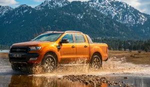 Ford-Ranger-pick-up-truck-is-off-roading-in-the-mud-of-the-river-in-the-mountains-of-Antalya