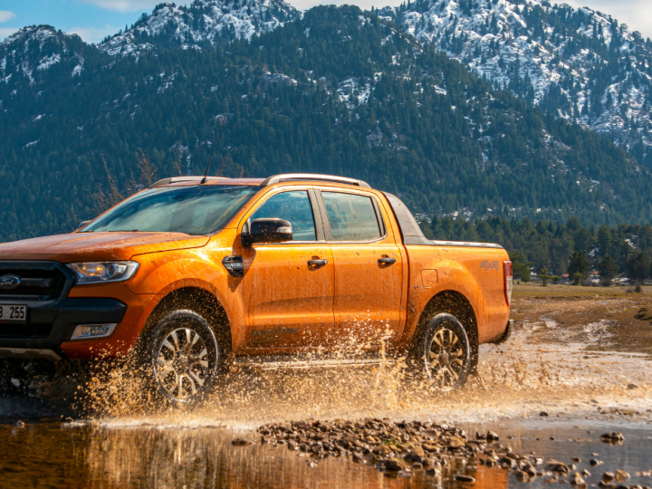 Ford-Ranger-pick-up-truck-is-off-roading-in-the-mud-of-the-river-in-the-mountains-of-Antalya